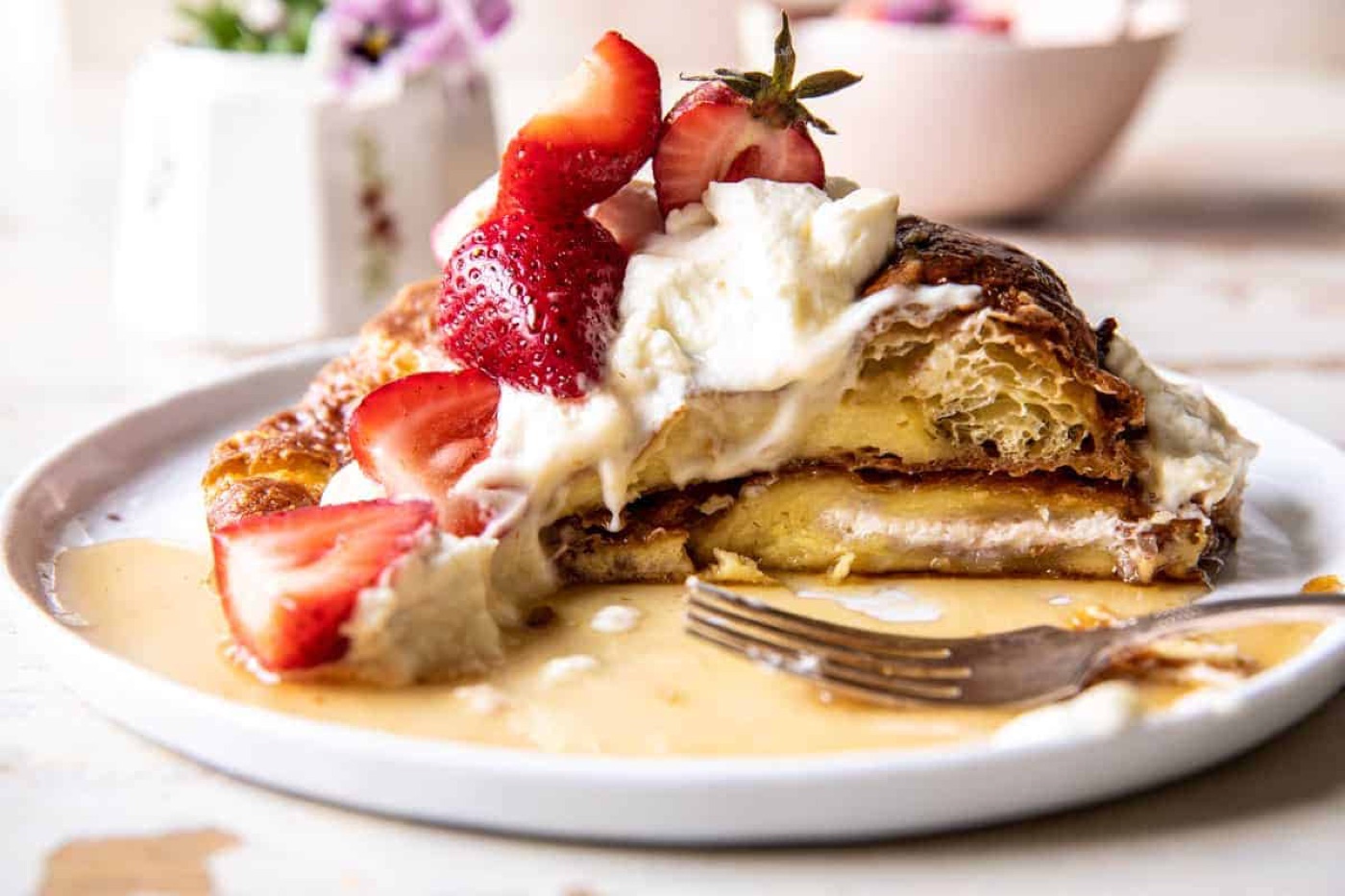 Baked Strawberry and Cream Stuffed Croissant French Toast